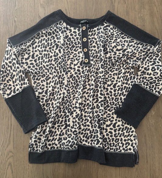 Black button cheetah top