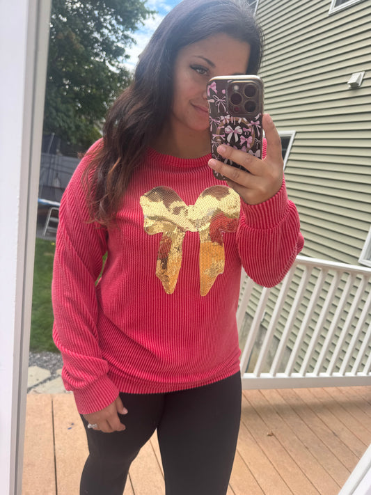 Red ribbed sequin bow top