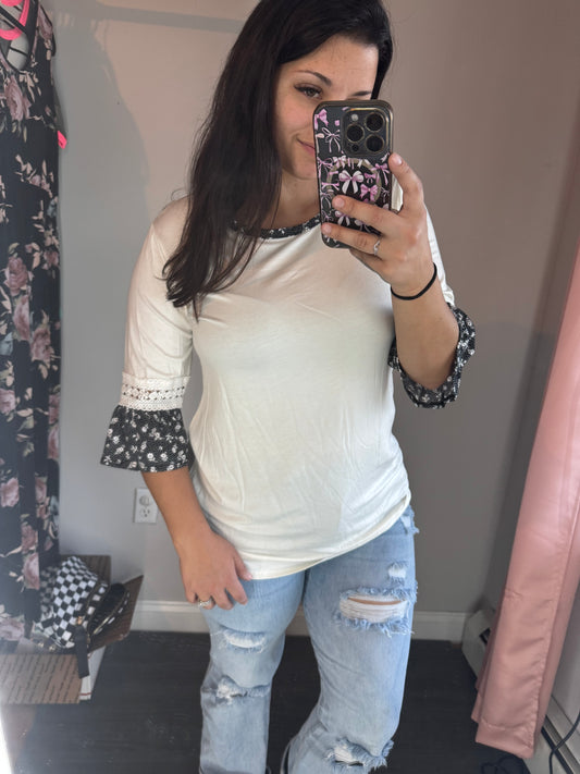 White floral flutter sleeve top